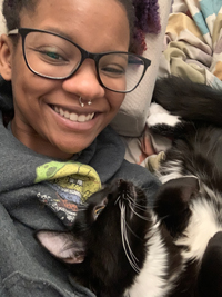 Reya and black and white cat